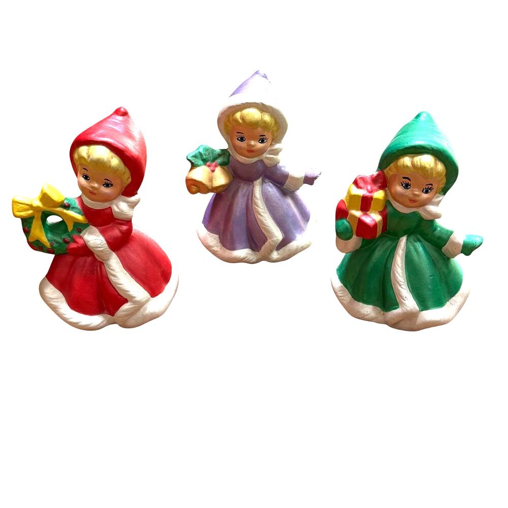 Vintage Christmas Girls Trio of ceramic holiday figures signed red green purple